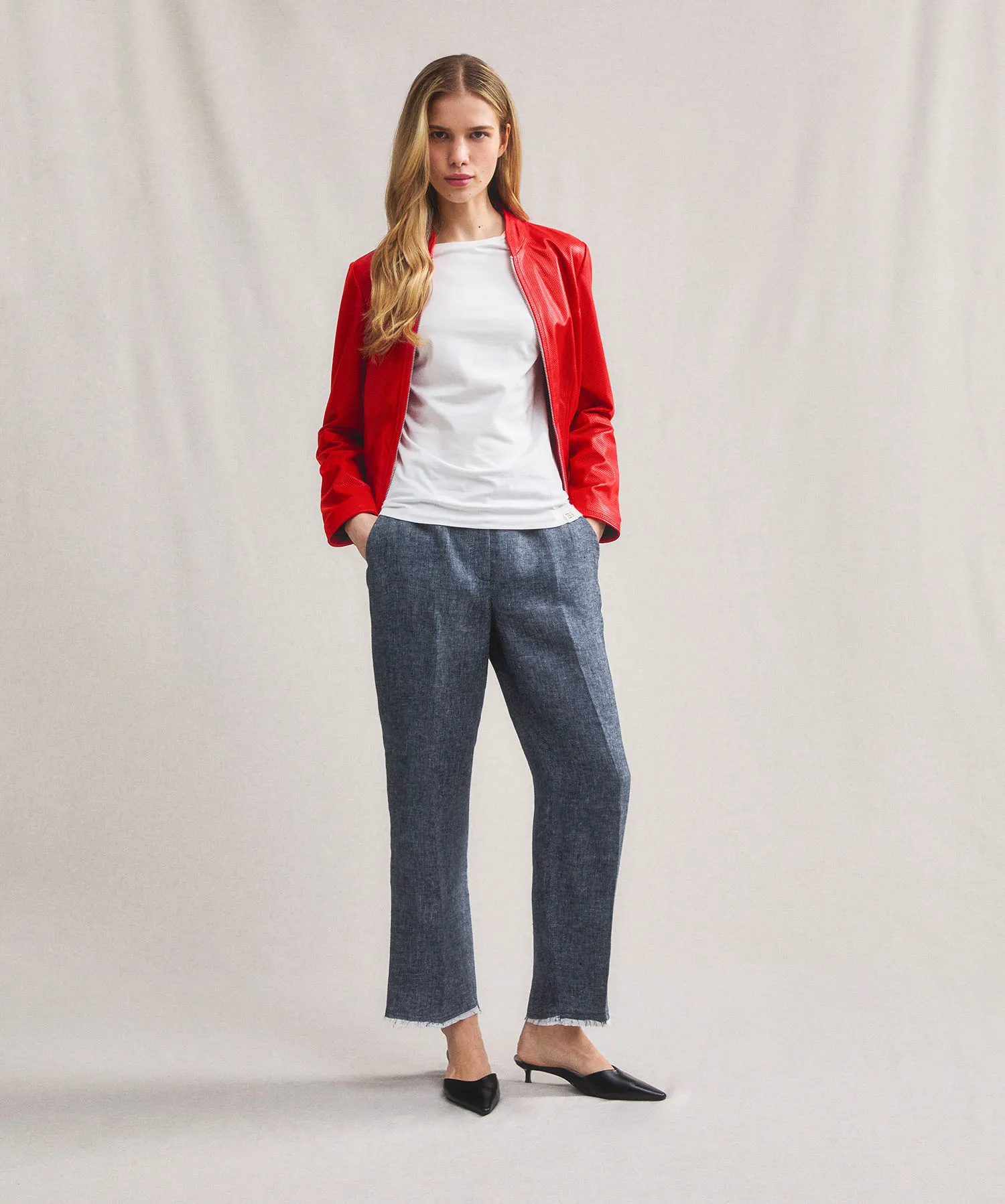 Giacca biker lucida in pelle traforata