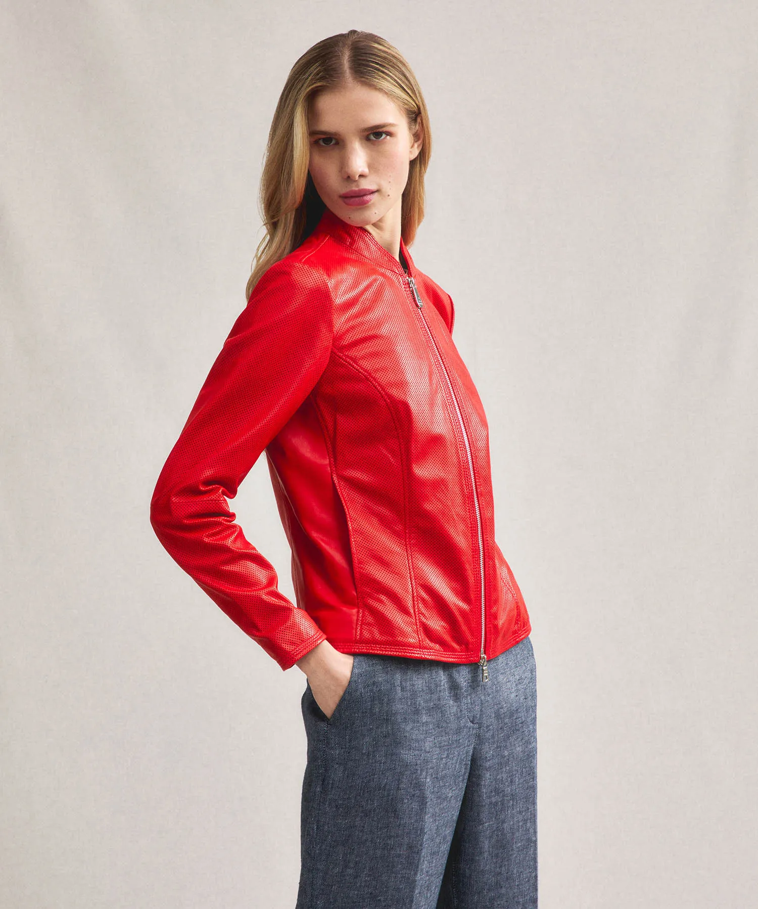Giacca biker lucida in pelle traforata