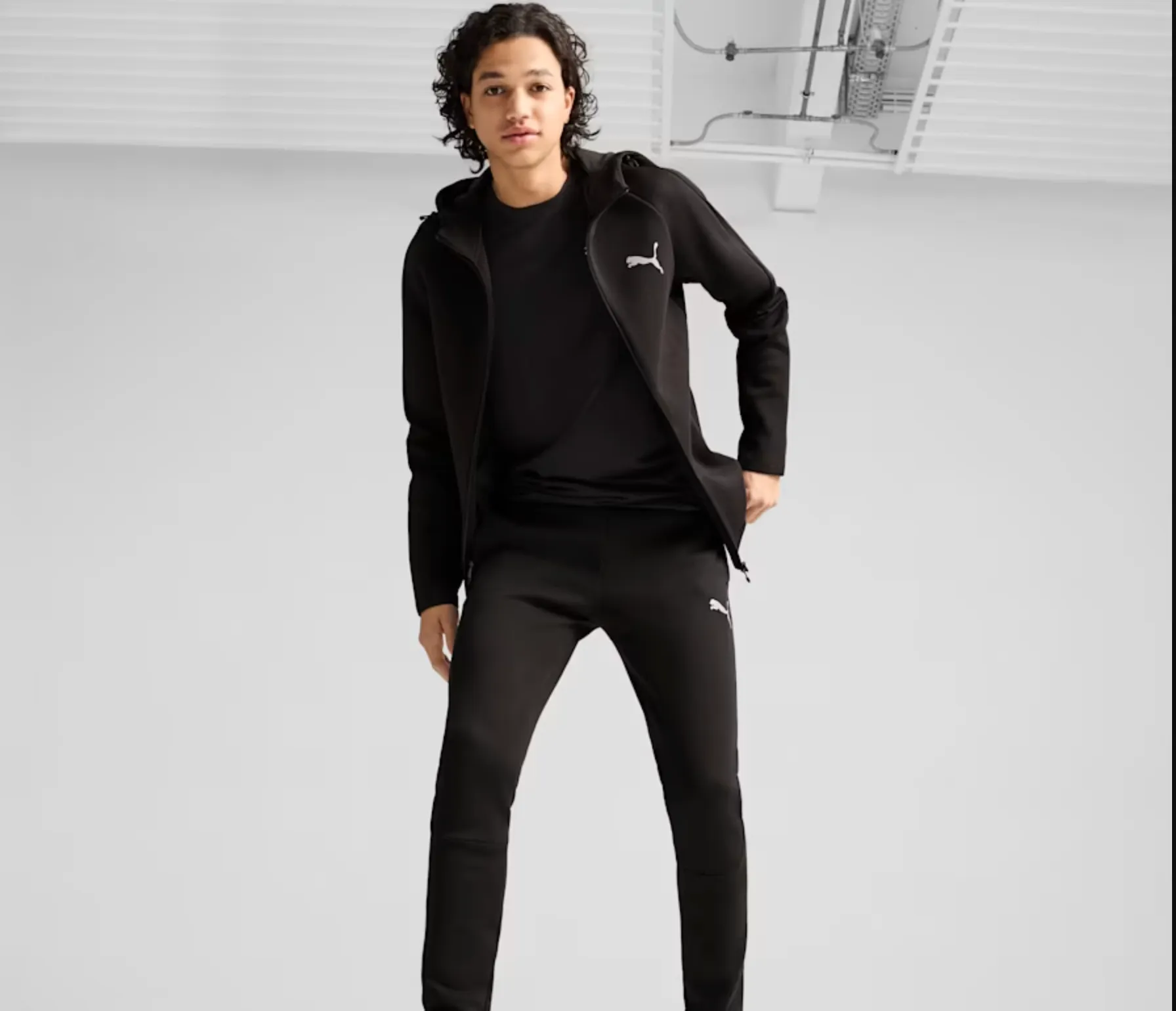 TUTA PUMA DONNA TECK  EVOSTRIPE
