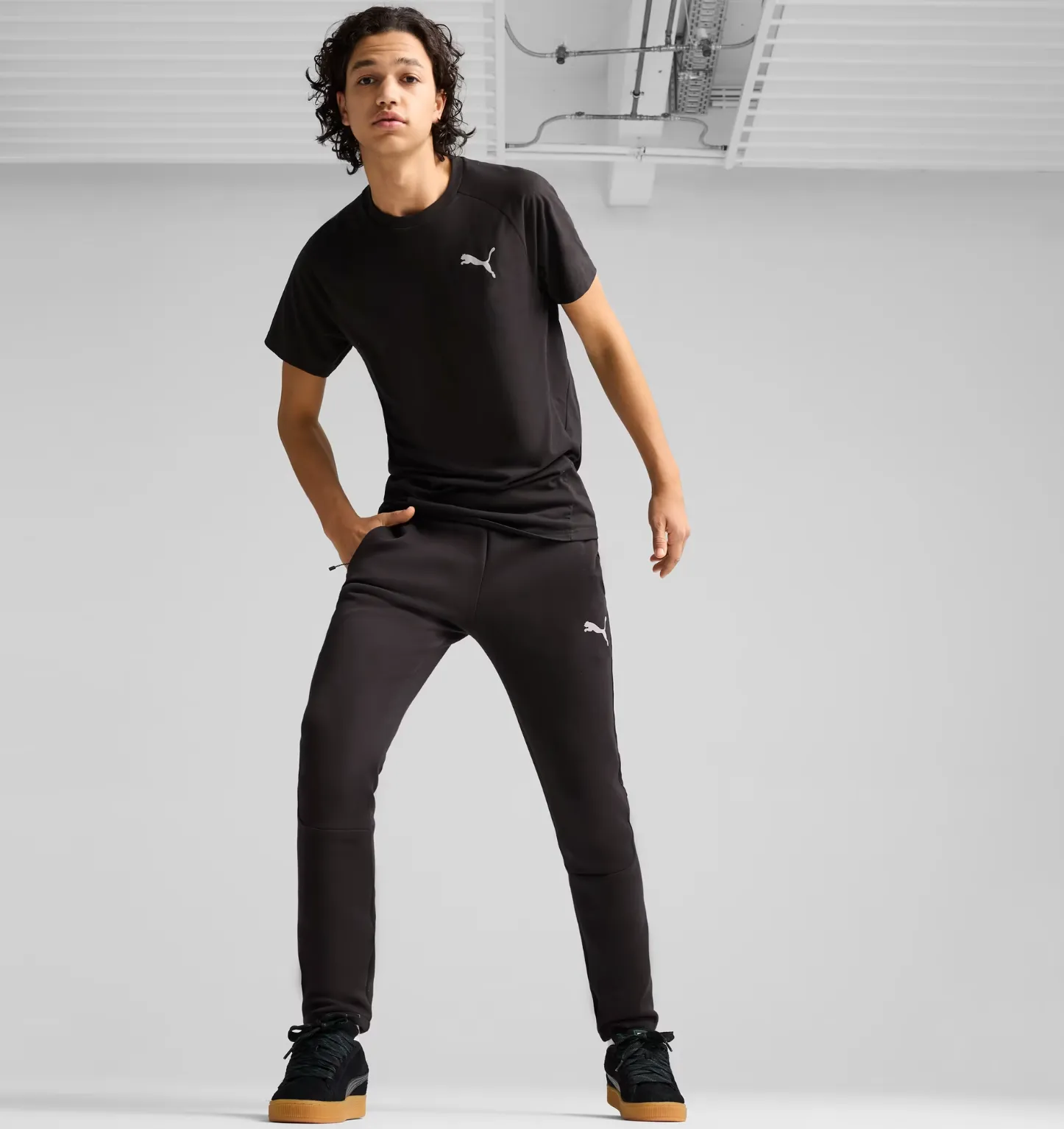 TUTA PUMA DONNA TECK  EVOSTRIPE